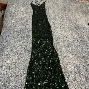 Long dark green and black dress. Crisscross back.